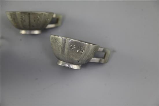 Three Chinese Yixing pewter and jade mounted cups, Daoguang period (1821-50), w. 8cm-8.6cm